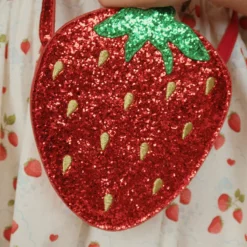 Konges Sløjd Glitzer-Schultertasche Erdbeere für Kinder „Tut / Barbados Cherry“