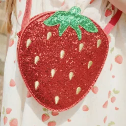 Konges Sløjd Glitzer-Schultertasche Erdbeere für Kinder „Tut / Barbados Cherry“